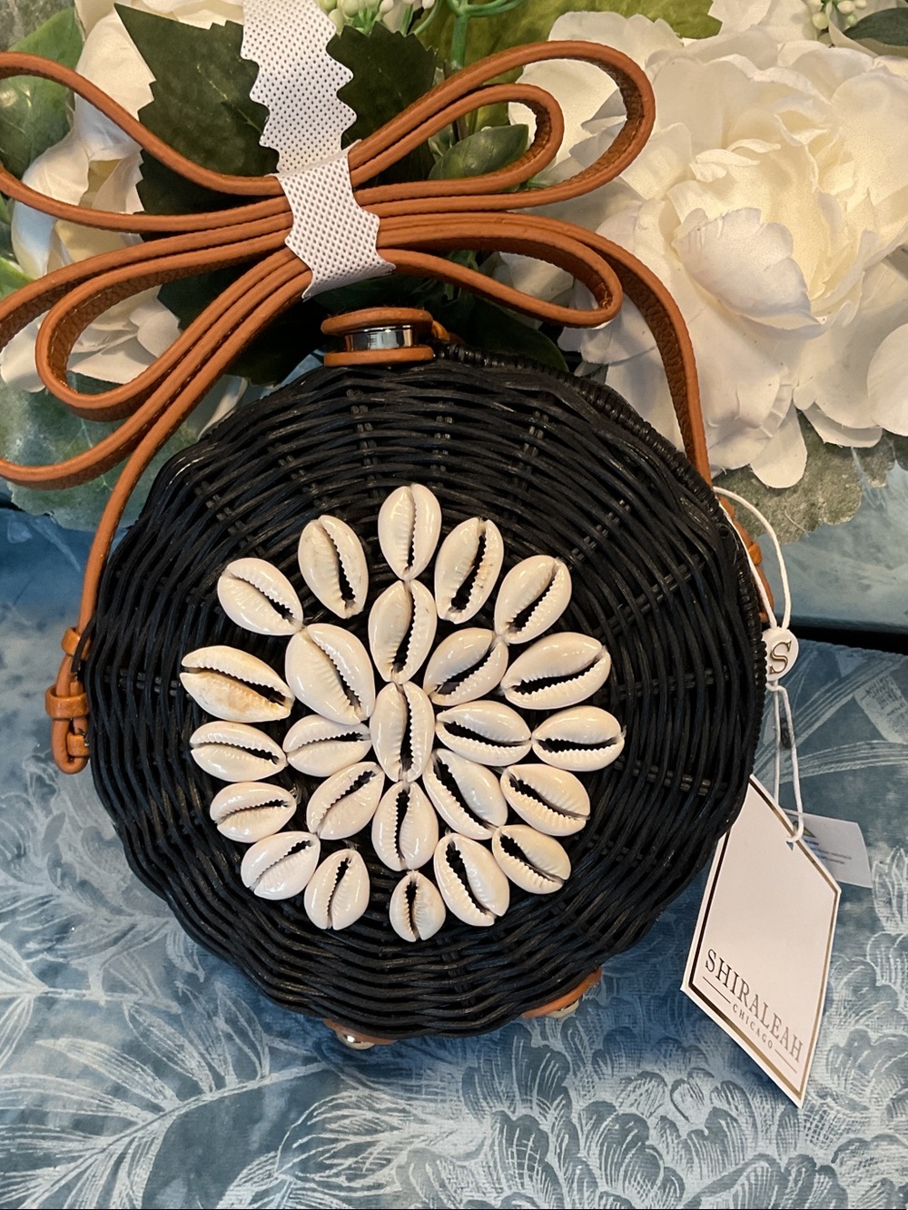 Shiraleah Black Bali Crossbody with White Shell Accent and Tan Strap
